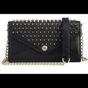 Rebecca Minkoff black leather envelope purse with gold chain and gold studs.